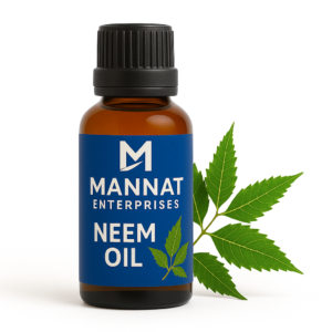 MANNAT ENTERPRISES Neem Oil in amber bottle with blue label and fresh neem leaves beside it