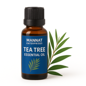 MANNAT ENTERPRISES Tea Tree Essential Oil in amber bottle with blue label and tea tree leaves